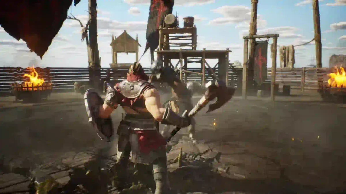 Official trailer frame: an armored fighter with an axe and shield faces an opponent in a wooden arena lit by braziers; this does not show the demo access point.